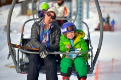 Alisa and Sage Thatcher on the chair