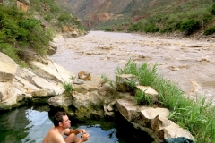 The-author-relaxing-in-a-natural-hotsprings-on-the-upper-Rio-Marañón