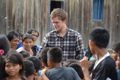 Tom-Morrison-talking-with-Awajún-villagers.-